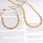 Twisted Double Layer Herringbone Snake Bracelet with background