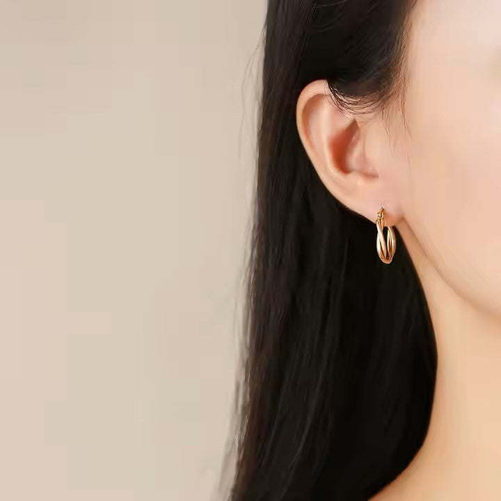 Twisted Hoop Earrings on model